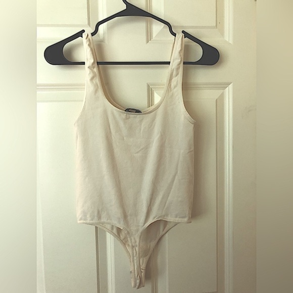 Bebe bodysuit light cream color size S - Picture 1 of 3